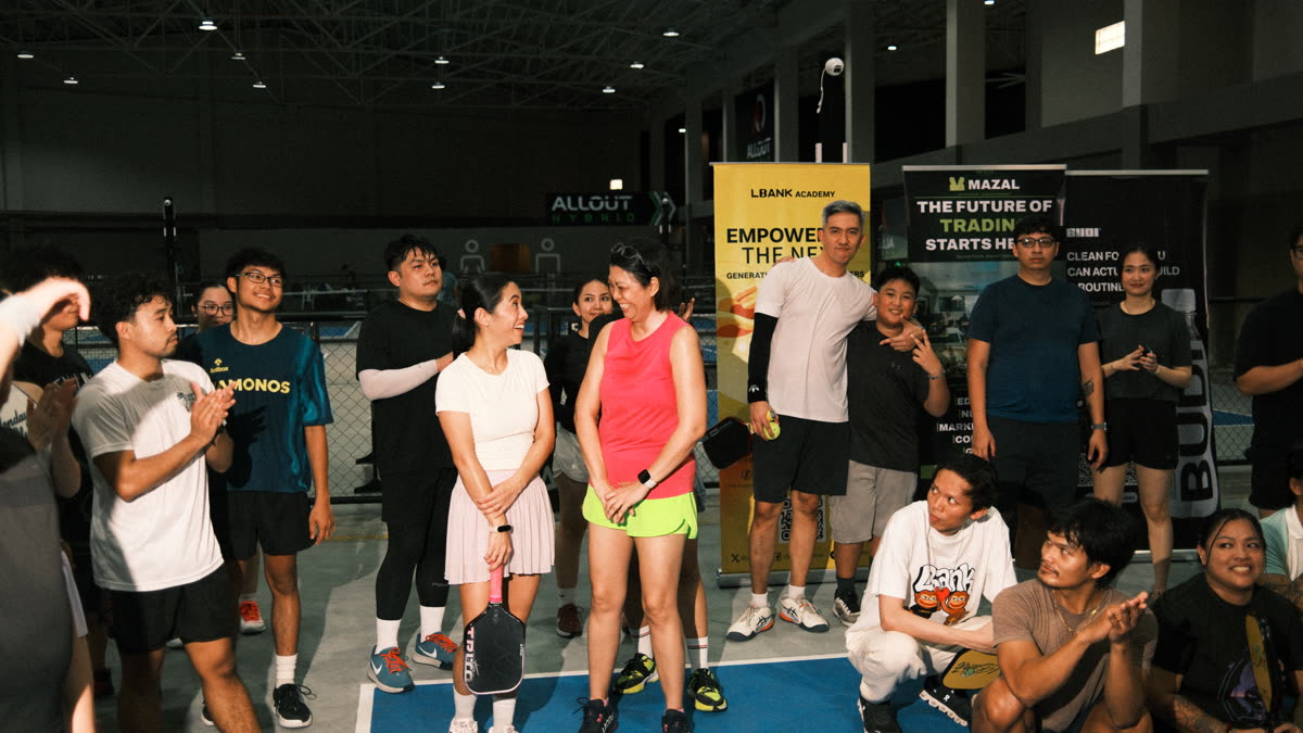 Monthly sporting event, community gathered courtside