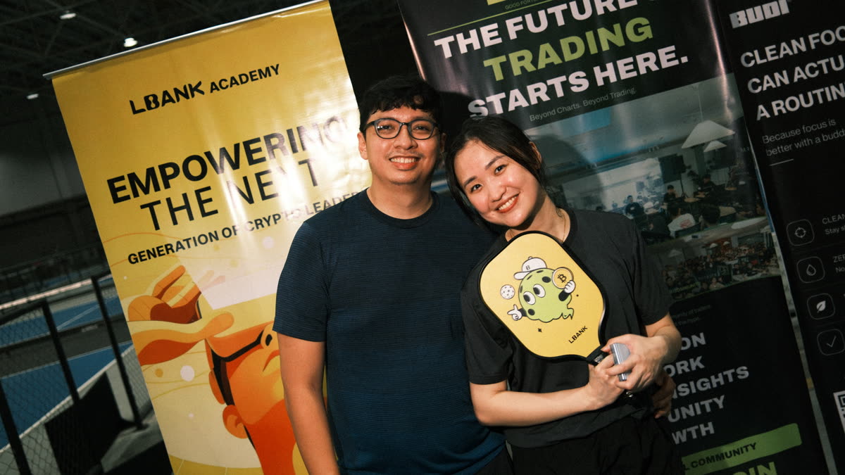 Monthly sporting event, members posing with paddles