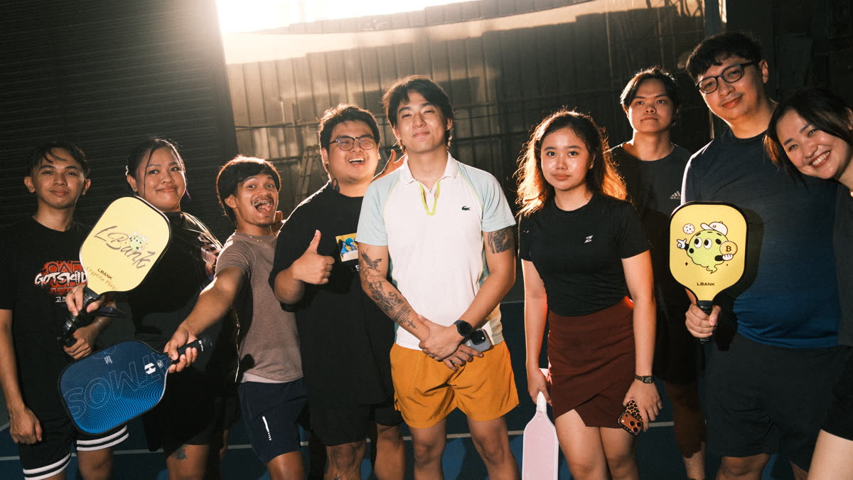 Monthly sporting event, group photo with paddles